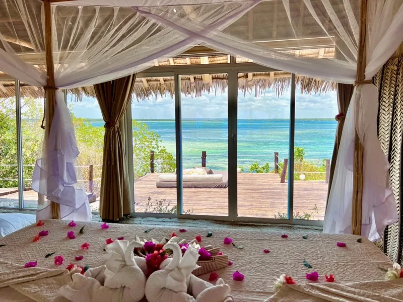 The Imperial Banda suite with its wide wooden terrace looking out over Mida Creek and the ocean
