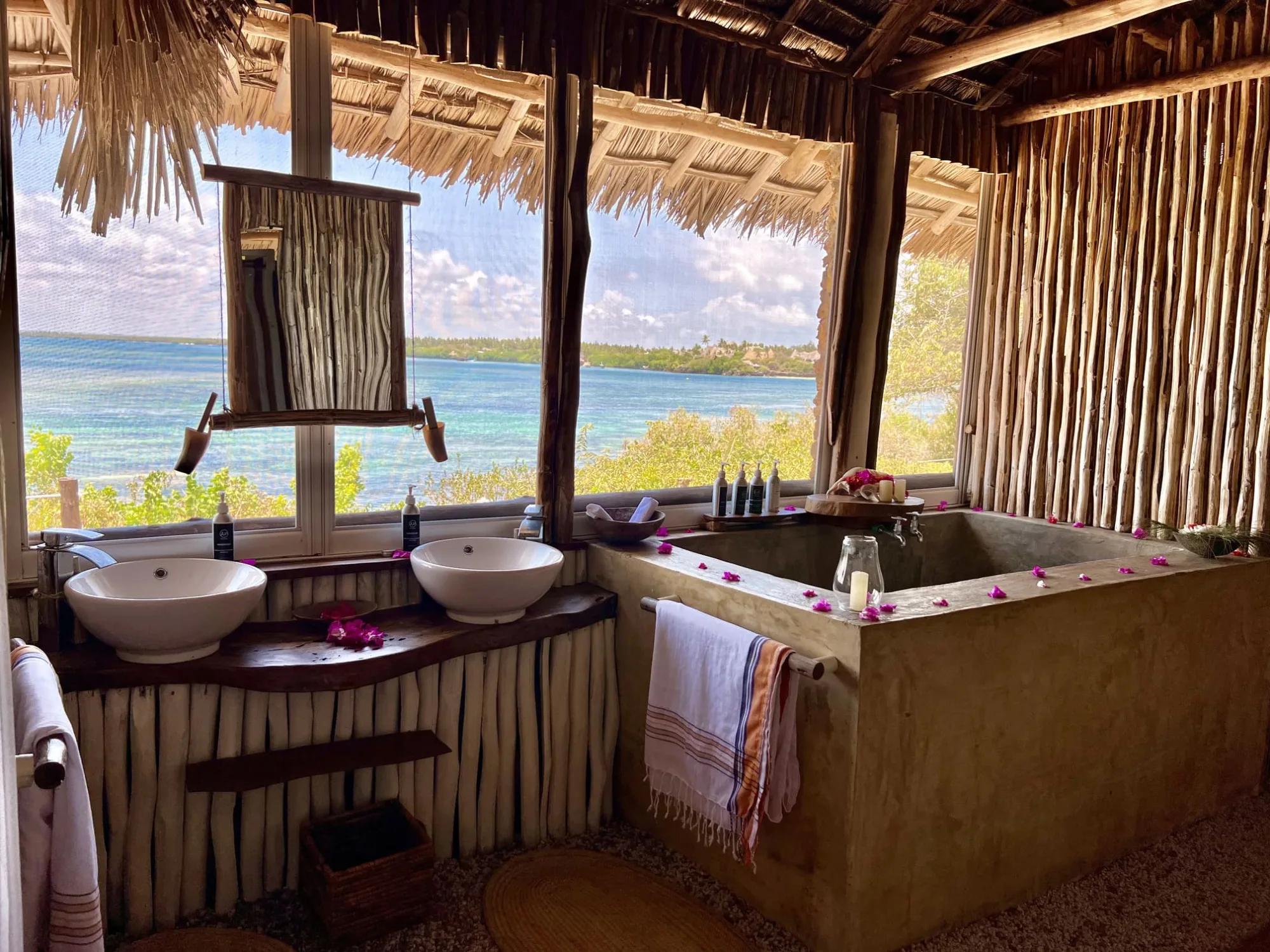 The Imperial Banda suite with its wide wooden terrace looking out over Mida Creek and the ocean